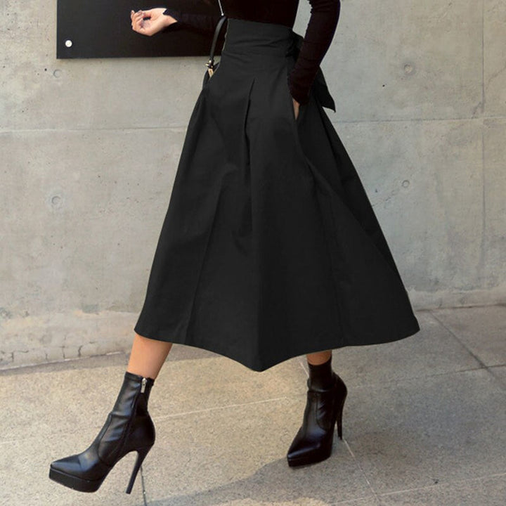 Trendy halflange rok voor dames in stijlvol legergroen. Perfecte midi-lengte voor een moderne look.