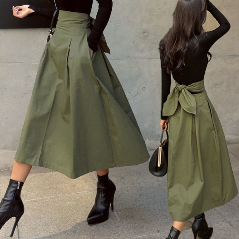 Trendy halflange damesrok in midi-lengte, beschikbaar in zwart, legergroen en kaki. Elegant en veelzijdig.