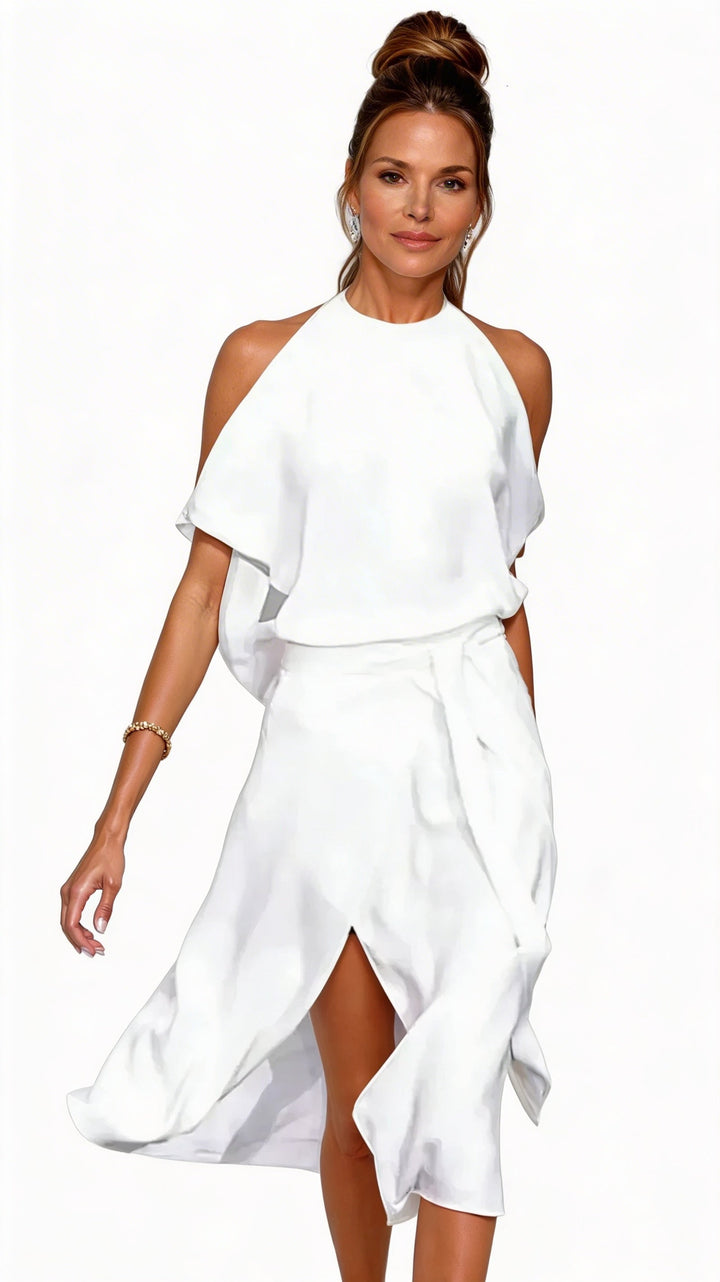 Elegante dames halter midijurk met open schouders en asymmetrische zoom, perfect voor feestjes.