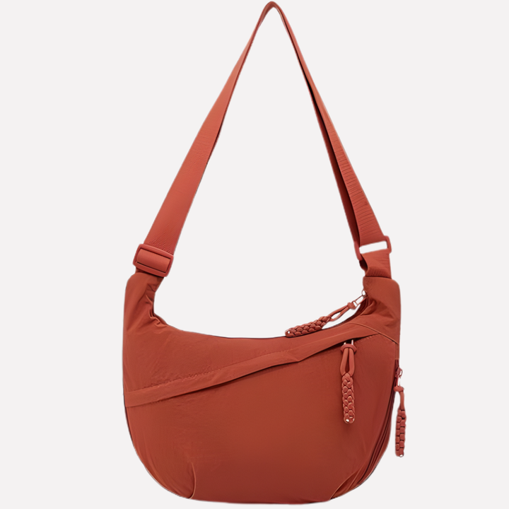 Stijlvolle en ruime zwarte nylon halvemaan dames crossbody tas met verstelbare band.