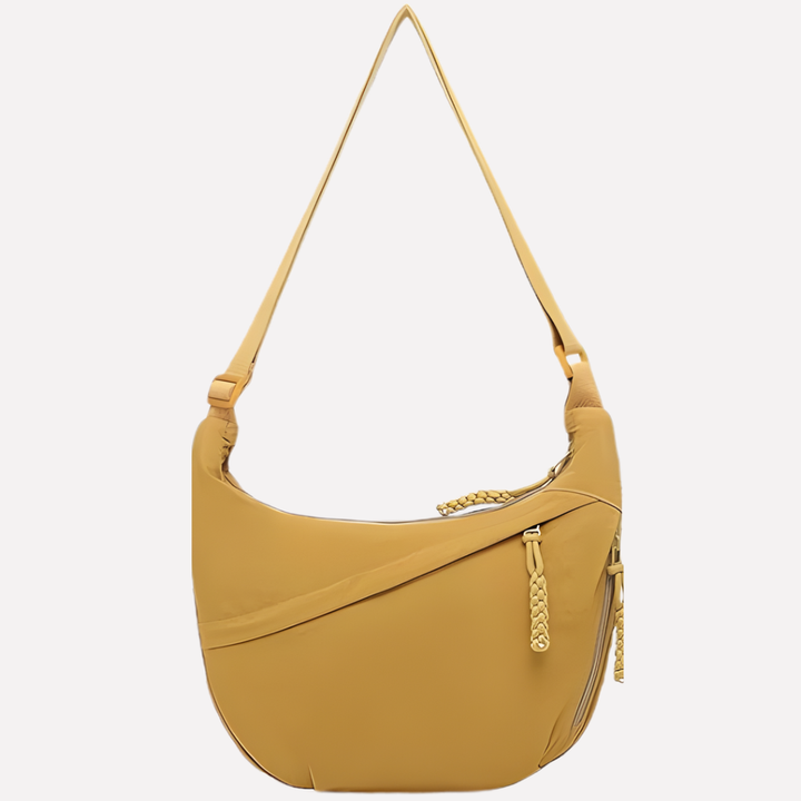 Casual en praktische halvemaan nylon tas, ideaal als ruime dames crossbody schoudertas.