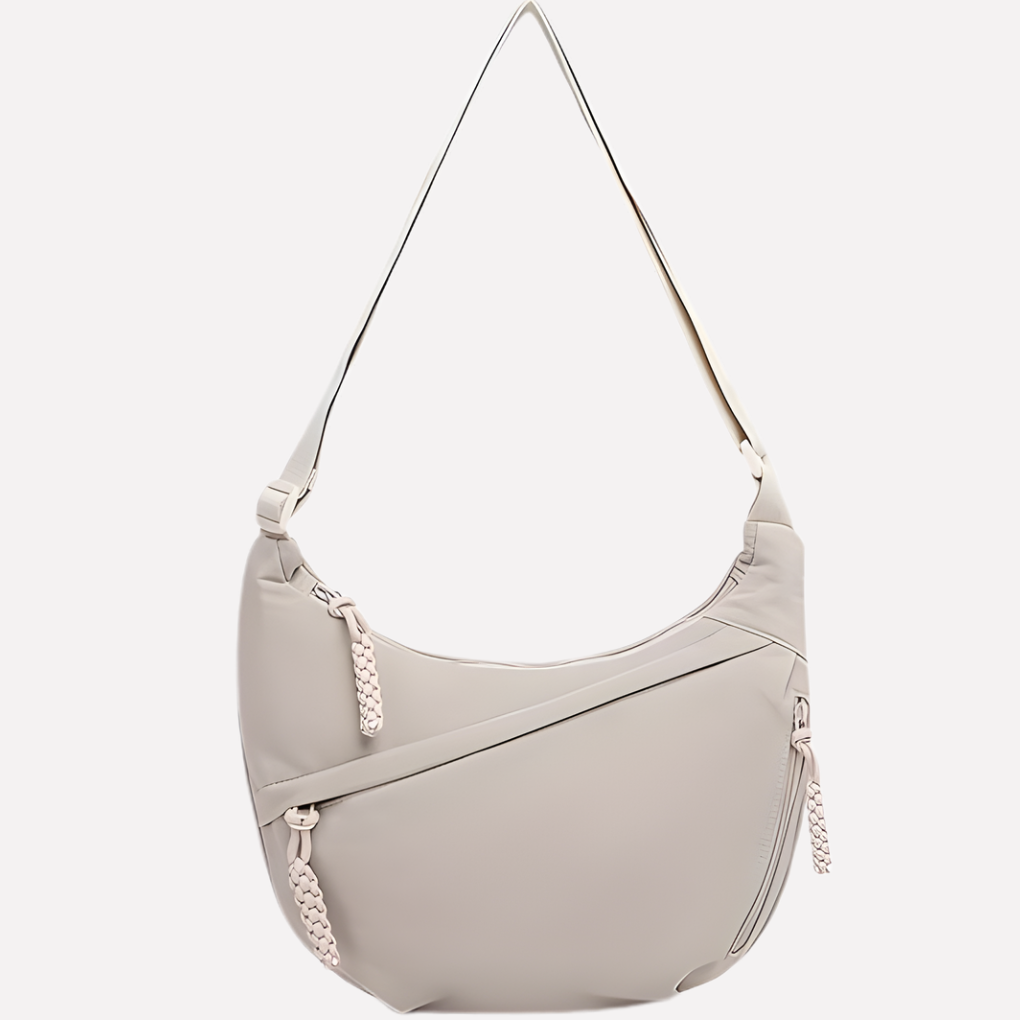Duurzame nylon halvemaan tas, een ruime en stijlvolle dames schoudertas voor elke dag.