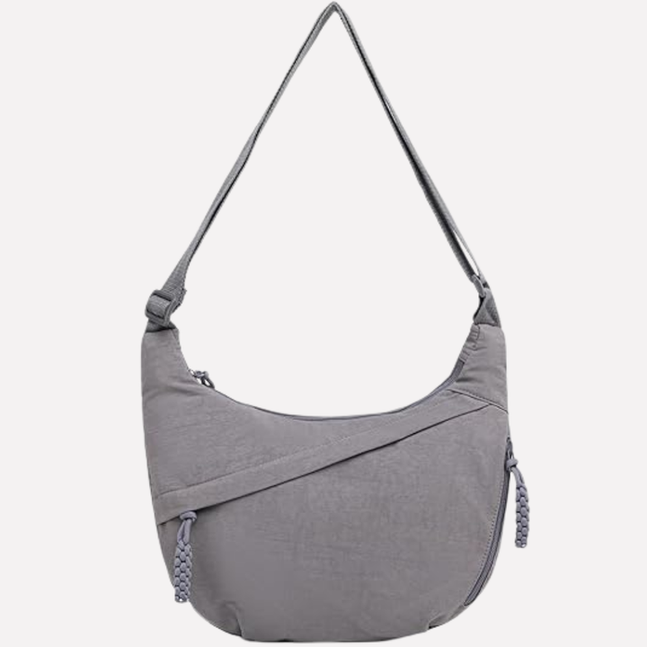 Toegang tot de ruime halvemaan crossbody tas, een handige nylon schoudertas voor vrouwen.
