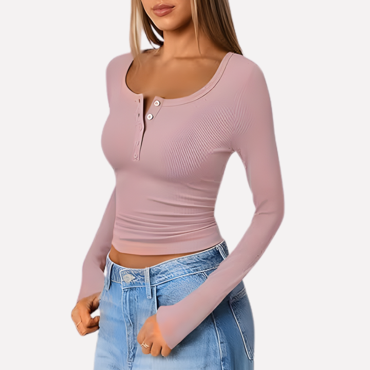 Zwarte Henley top dames met lange mouwen, detail van knopen en een stijlvolle pasvorm.