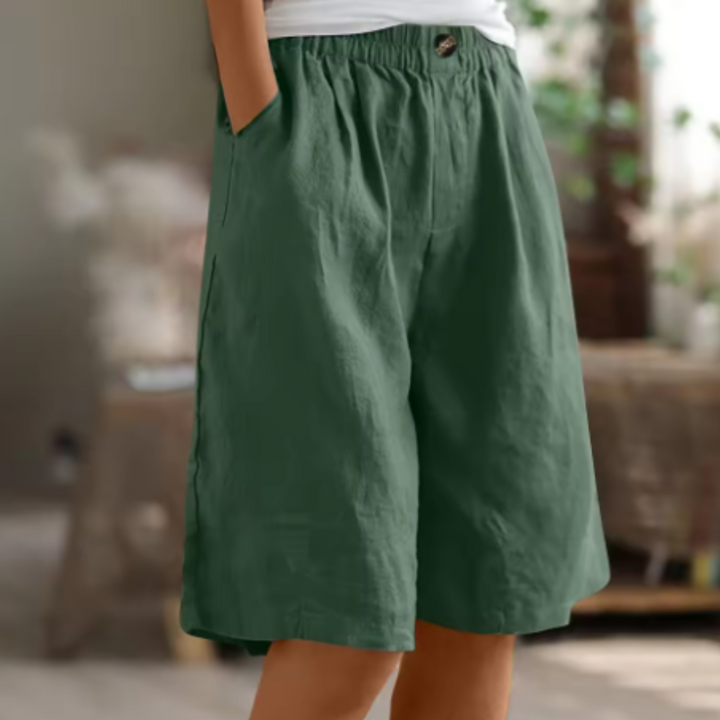 Ademende high waist wijde pijpen shorts, ideaal voor warme zomerdagen.