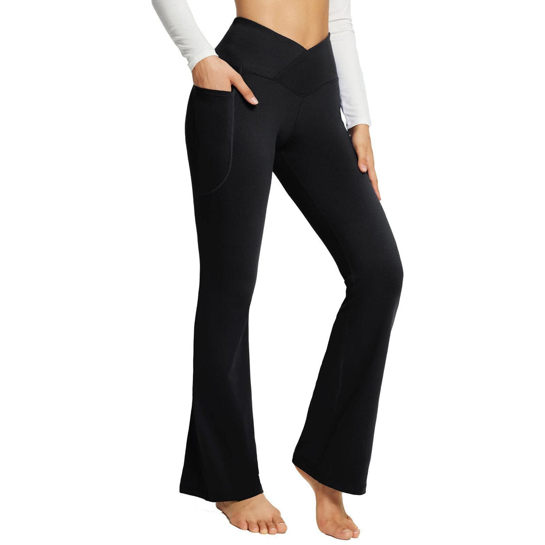 Flare dames yoga broek met hoge taille, ideaal voor fitness en comfortabel sporten. Met handige zijzakken.