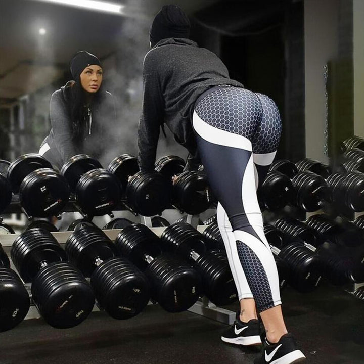 Dames yoga legging Aurora met comfortabele hoge taille en stijlvol geometrisch patroon.