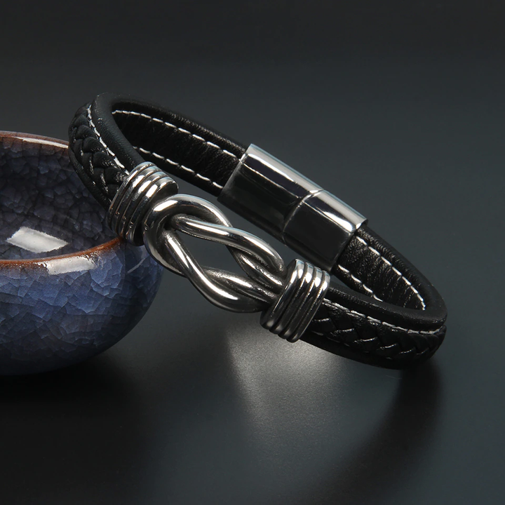 Dames infinity lederen knoop armband, stijlvol accessoire voor dagelijks gebruik.