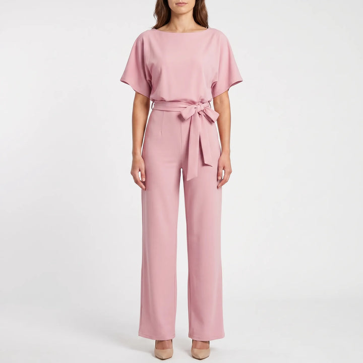 Trendy dames jumpsuit met batwing mouwen & elegant sleutelgat detail. Wijde pijpen voor een casual chic look.
