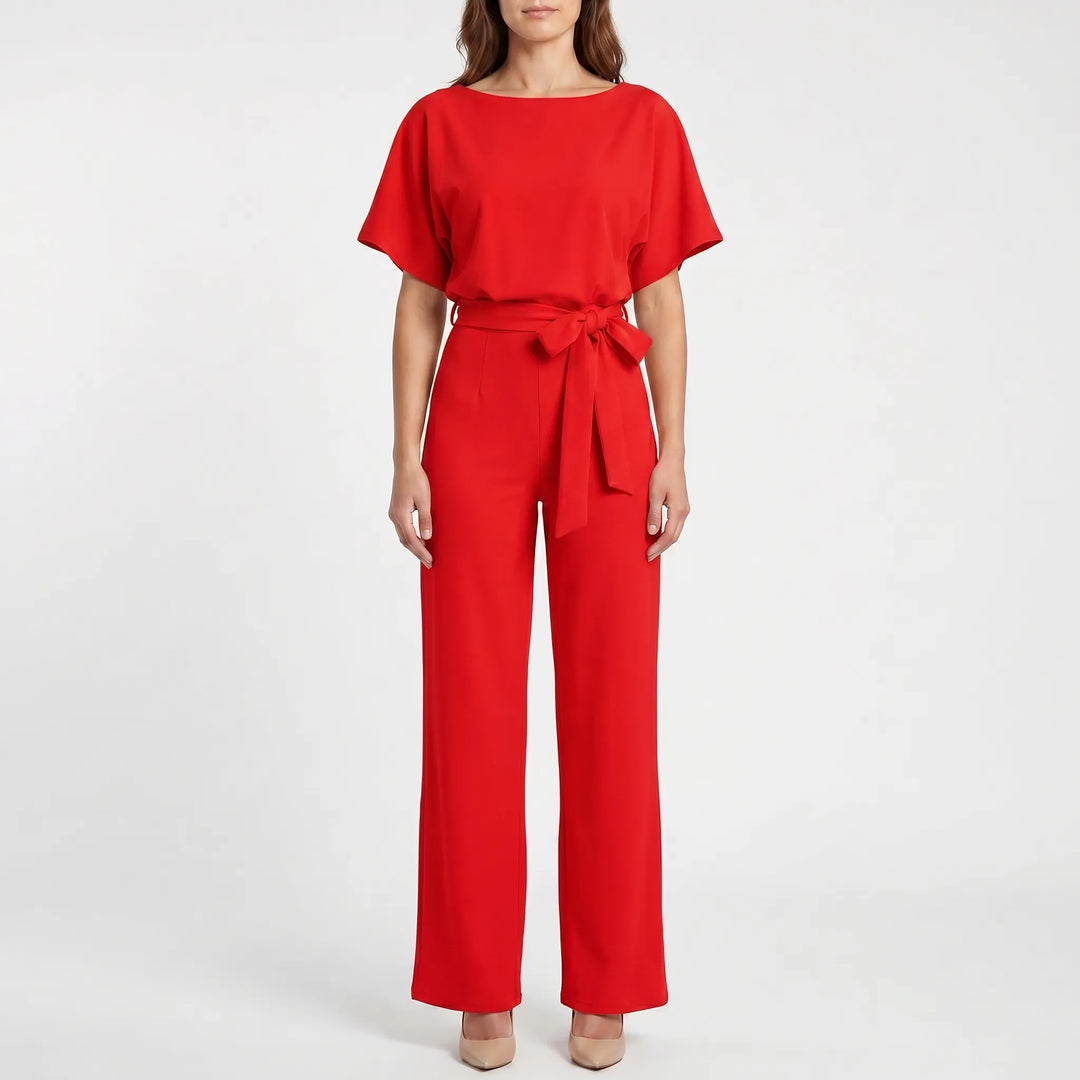 Veelzijdige dames jumpsuit met wijde pijpen & korte mouwen. Geschikt voor zowel casual als feestelijke outfits.