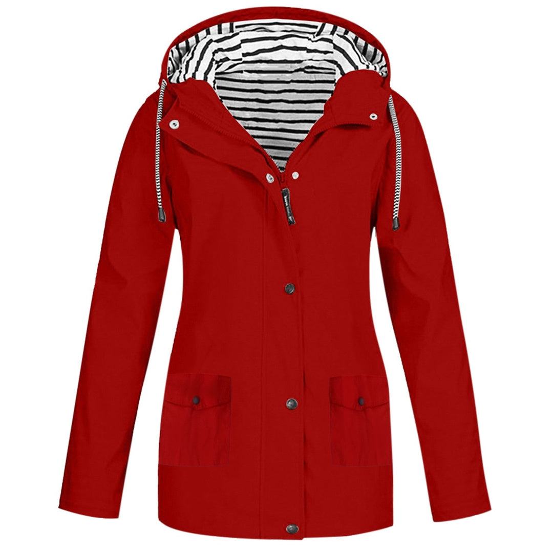 Close-up van de waterdichte stof van de KarieJacket damesjas. Beschermt tegen regen en wind, perfect voor wandelen.