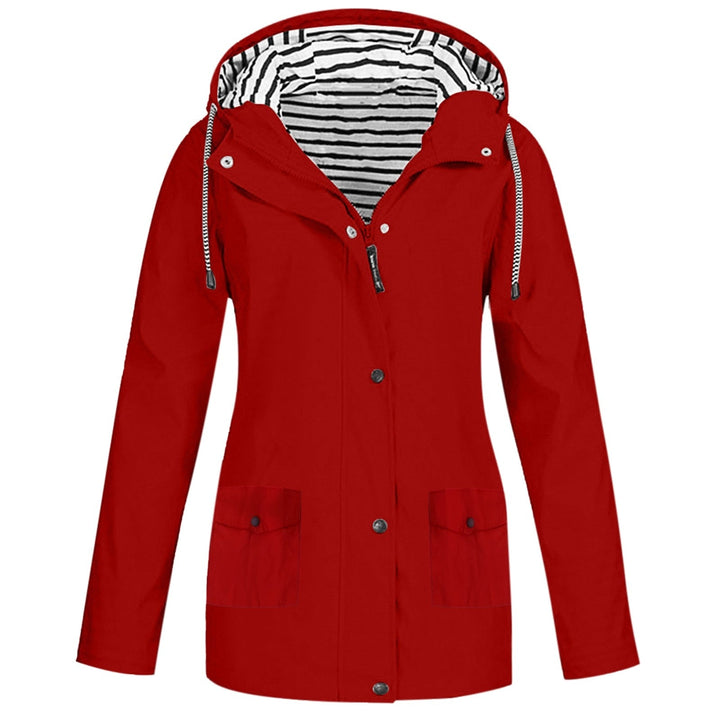 Close-up van de waterdichte stof van de KarieJacket damesjas. Beschermt tegen regen en wind, perfect voor wandelen.