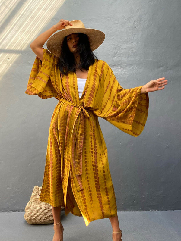 De Leona dames kimono met strikriem, perfect voor een modieuze lagenlook en comfort.
