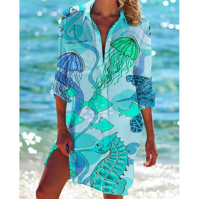 Bloemenprint zomerblouse voor dames met Hawaii-thema. Comfortabele, losvallende korte mouw blouse in vrolijke kleuren.