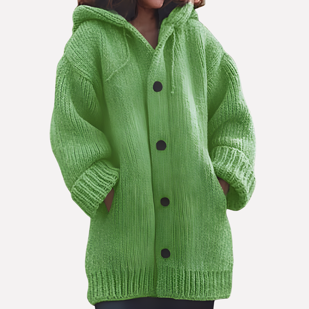 Model draagt een geel dames hoodie vest met lange snit, comfortabele vrijetijdskleding.