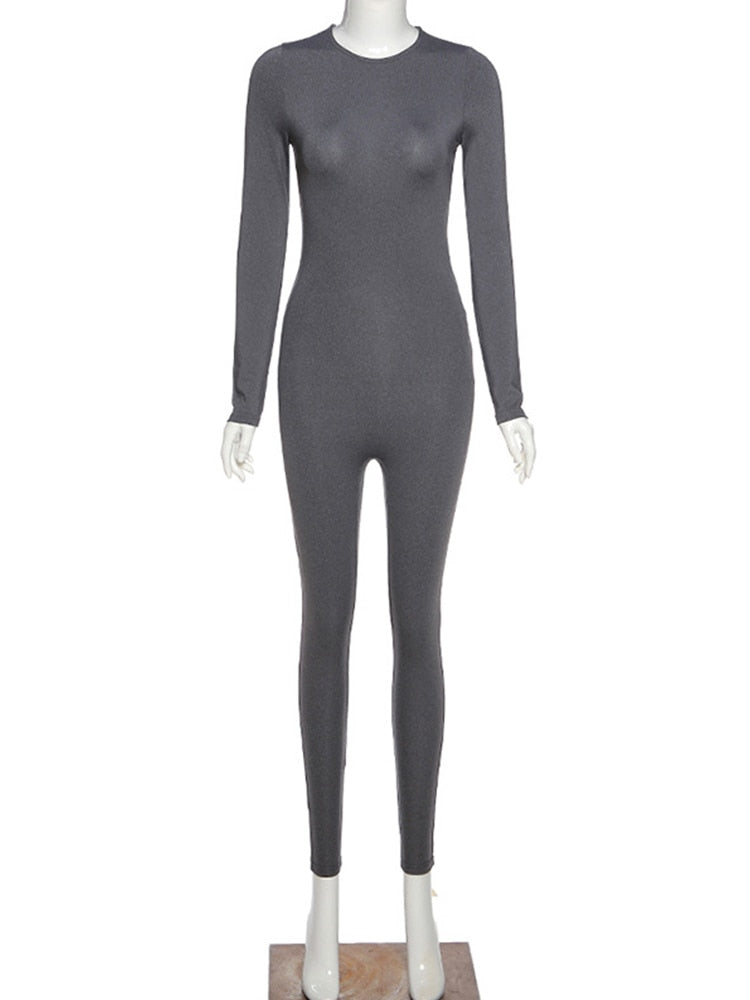 Moderne sport jumpsuit voor dames, lange mouw. Perfect als gymkleding en comfortabele athleisure outfit.