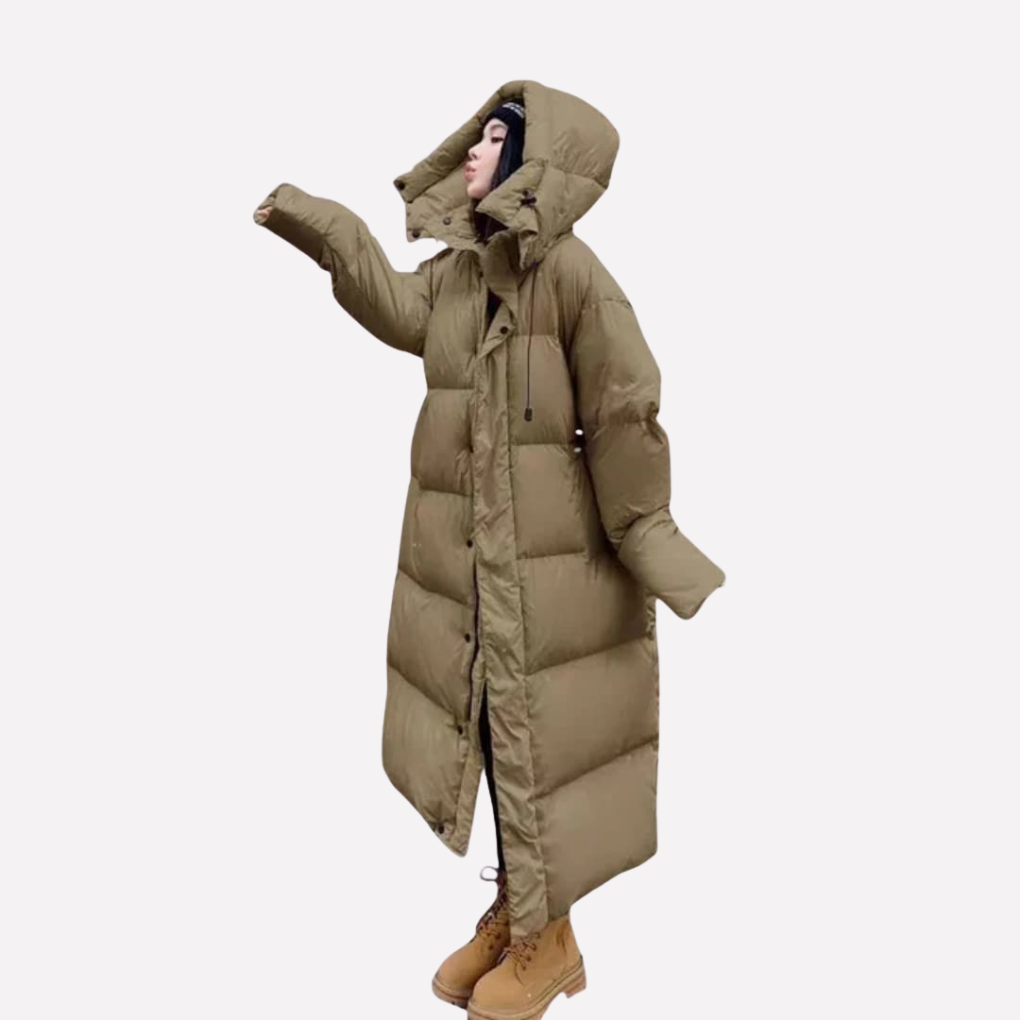 Stijlvolle dames lange pufferjas met capuchon, een comfortabele en warme gewatteerde winterjas voor haar.