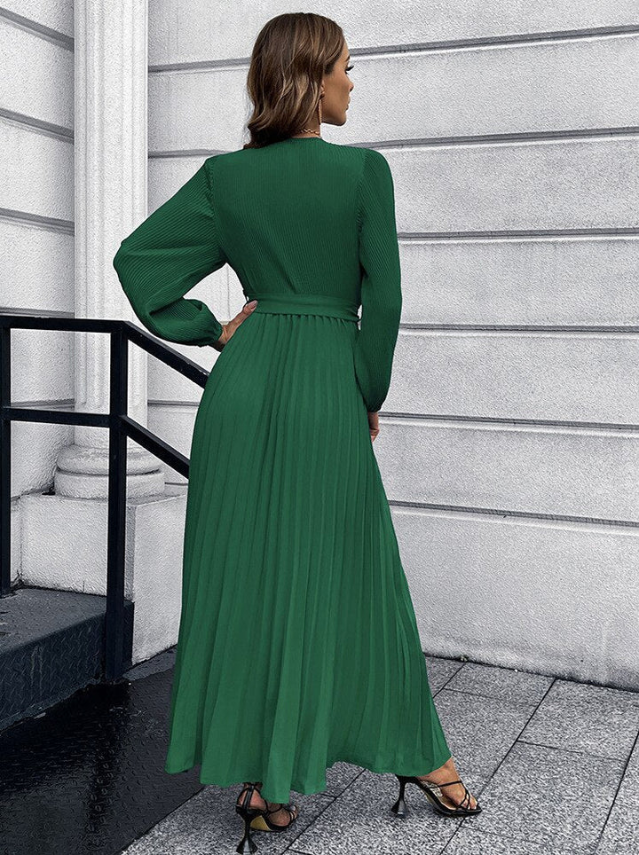 Stijlvolle dames lente zomer maxi jurk met V-hals en geplooide details. Geschikt voor casual en elegante gelegenheden.