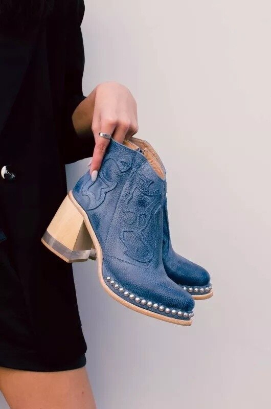 Trendy dames western laarzen met unieke stiksels, ideaal voor een stoere en modieuze look.