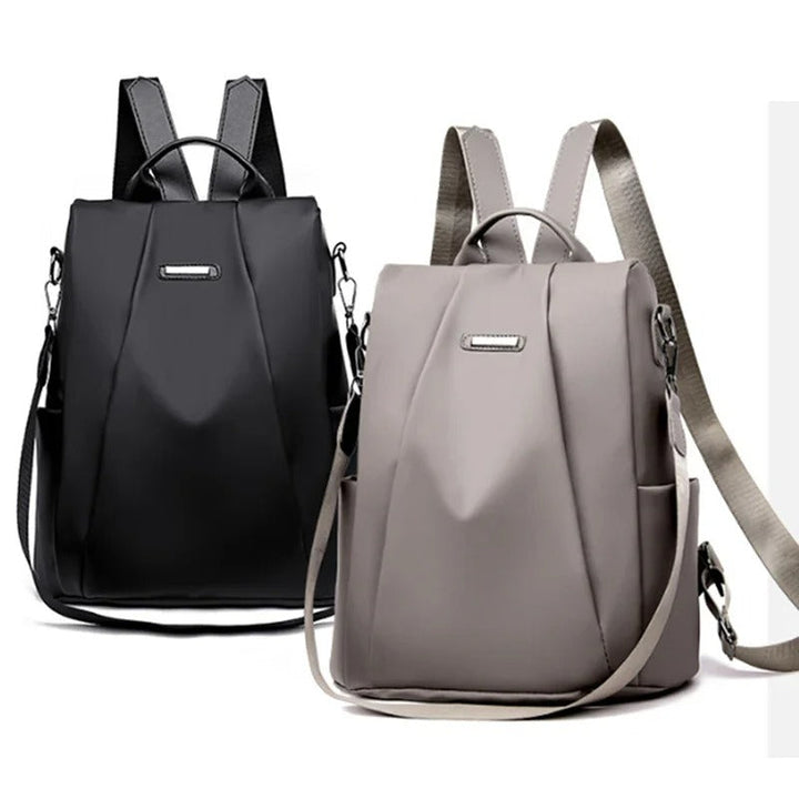 Praktische waterafstotende dames reistas. Lichtgewicht nylon rugzak, perfect voor weekendtrips en daguitjes.