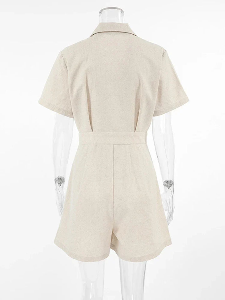 Dames zomerjumpsuit met korte mouwen, ideaal voor kantoor of vakantie. Stijlvol, comfortabel en ademend.