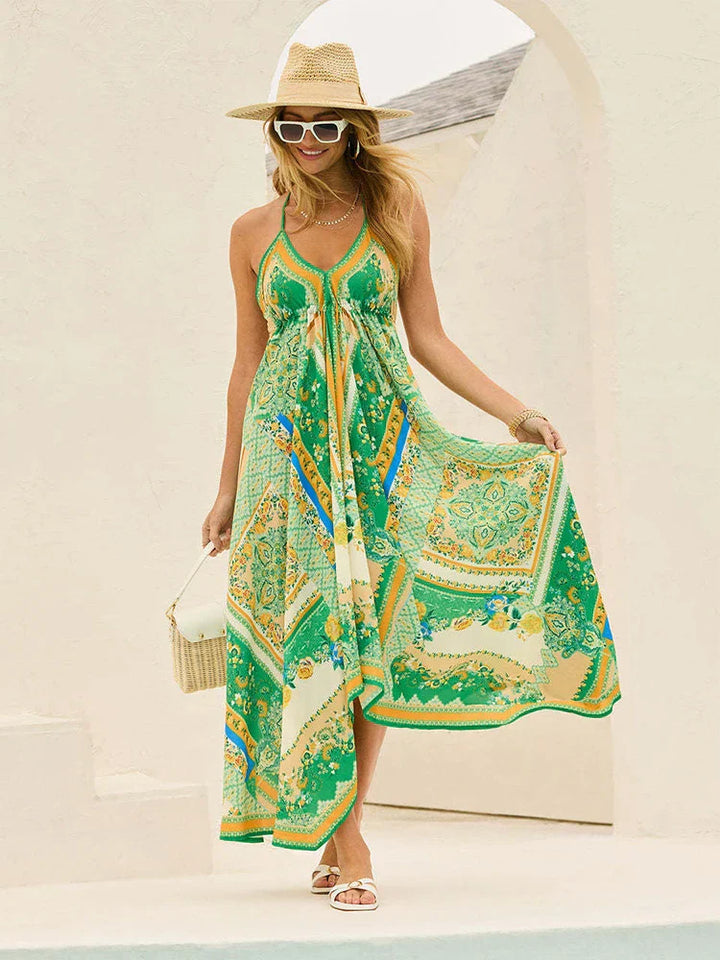 Festival-ready boho maxi jurk met halternek en v-hals. Trendy en luchtig voor een stijlvolle zomer.