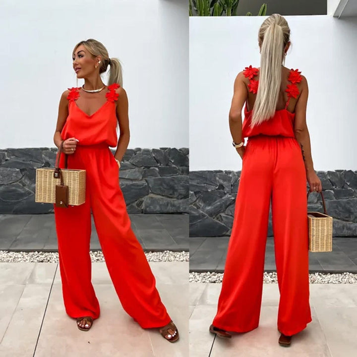 Comfortabele mouwloze dames jumpsuit met wijde pijpen, ideaal voor zomerse dagen en vakantie.