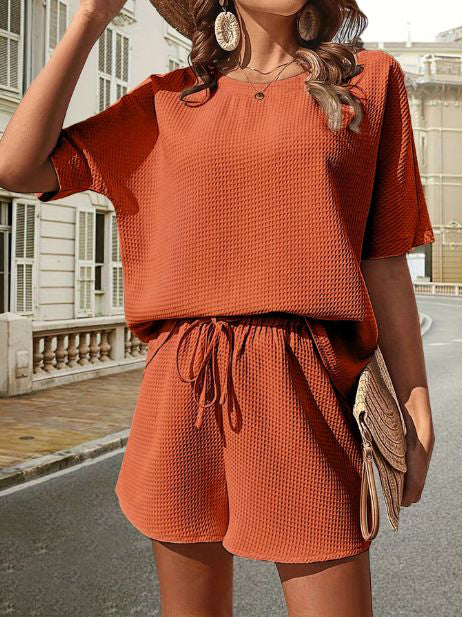 Zomercollectie dames: complete set met luchtige top en comfortabele shorts, perfect voor de vakantie.