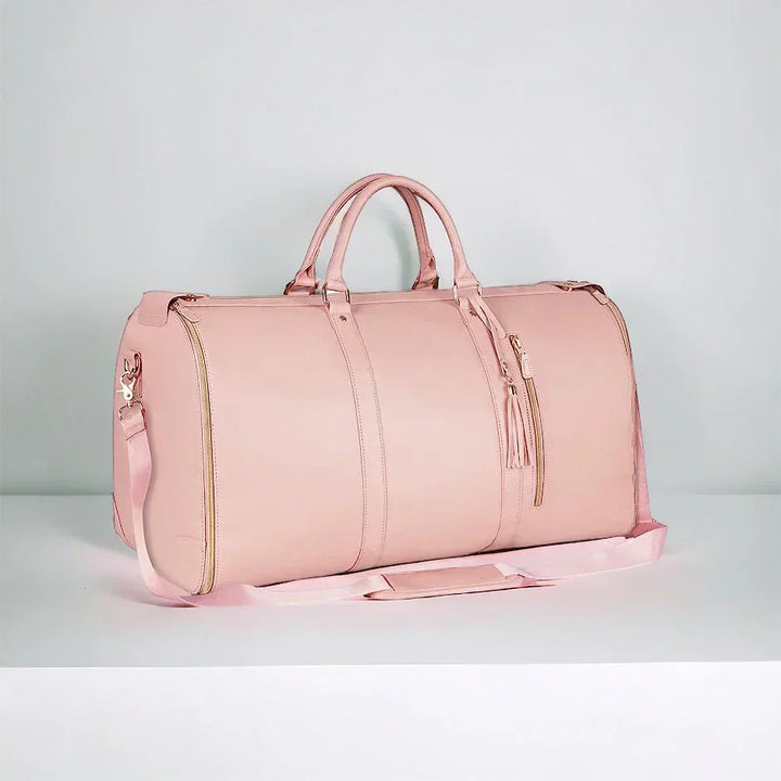 Stijlvolle veganleer dames reistas Isabelle. Waterbestendige duffelbag en kledingtas voor georganiseerd reizen.
