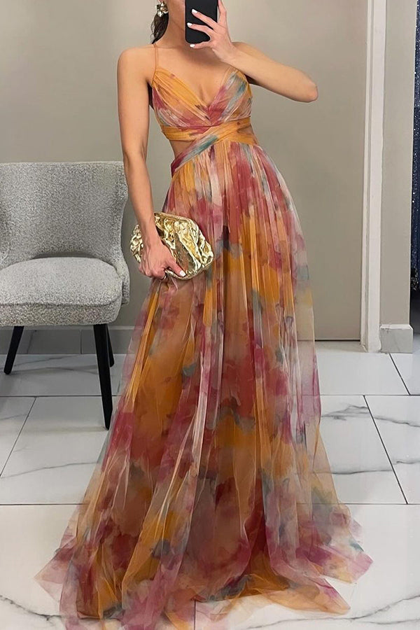 Perfecte zomerjurk dames: lange maxi jurk met bloemen, spaghettibandjes en A-lijn model.
