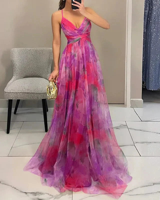 Levendige bloemen maxi jurk voor dames met spaghettibandjes, ideaal voor een zonnige dag.