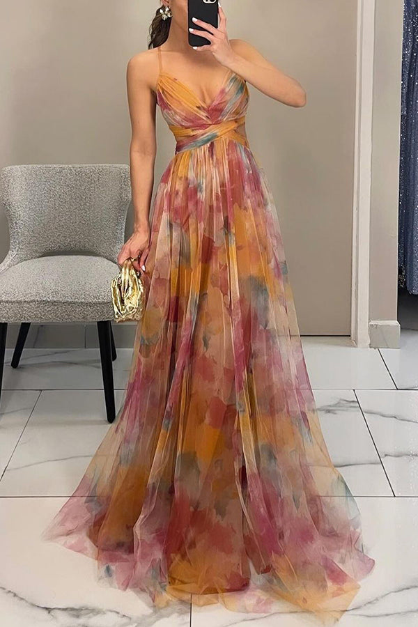 Flowy A-lijn maxi jurk met delicate bloemenprint en verstelbare spaghettibandjes voor dames.