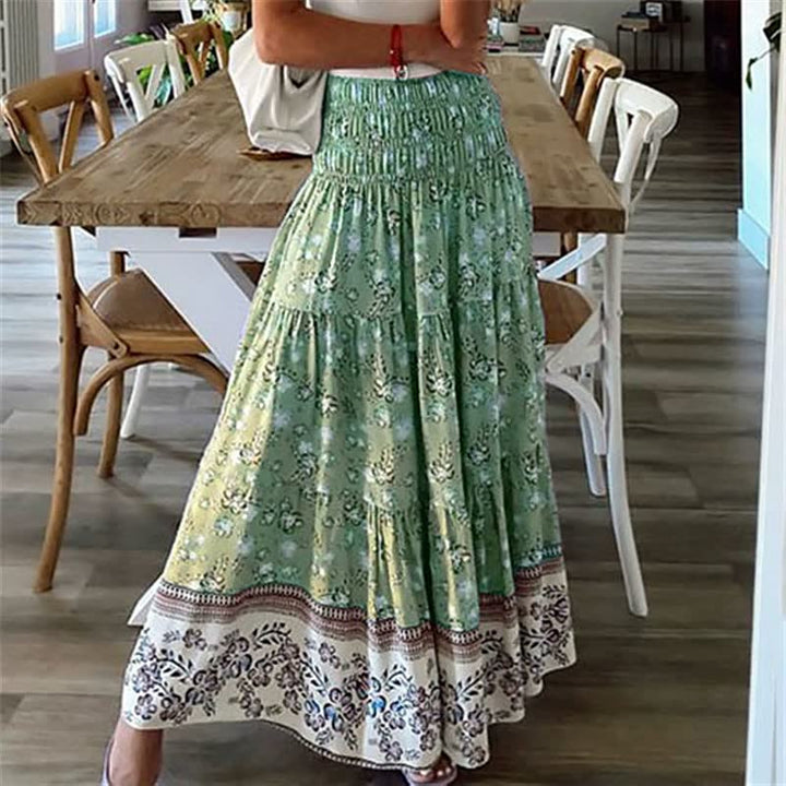 Comfortabele elastische dames maxi rok met trendy boho bloemenprint, perfect voor warme zomerdagen.