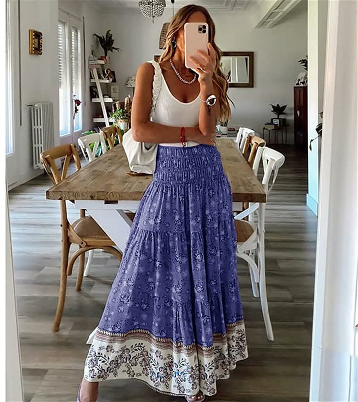 Trendy dames maxi rok met levendige boho bloemenprint, een must-have voor zomerse modieuze vrouwenkleding.