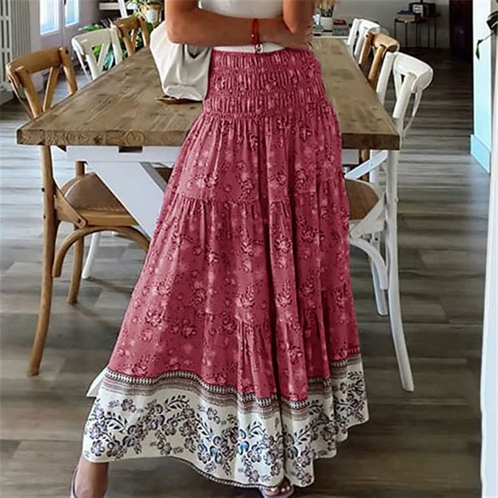 Zomerse dames maxi rok met modieuze boho bloemenprint. Comfortabele en trendy vrouwenrok.