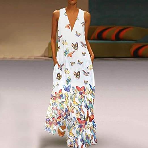 Dames maxi zomerjurk Malia met levendig vlinderpatroon. Trendy, mouwloos en comfortabel voor warme dagen.