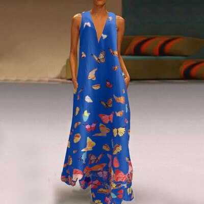 Mouwloze maxi jurk voor dames, perfect als zomerjurk of strandjurk. Vrolijk vlinderpatroon, trendy Malia design.
