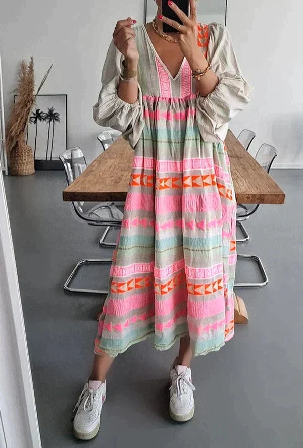 Dames maxi zomerjurk Solenne met vrolijk kleurverloop, perfect voor strand of een casual zomerse dag.