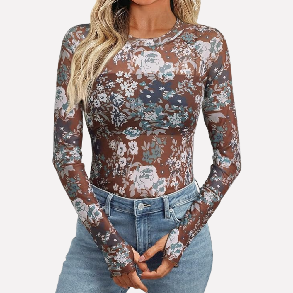 Trendy dames doorzichtige mesh top met kanten details en lange mouwen. Ideaal voor uitgaan.