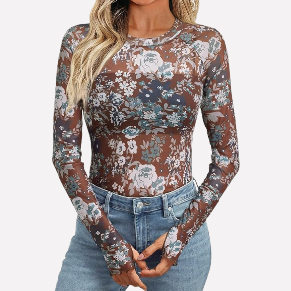 Trendy dames doorzichtige mesh top met kanten details en lange mouwen. Ideaal voor uitgaan.