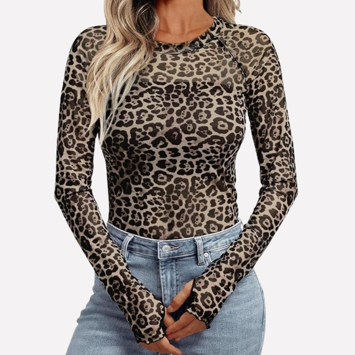 Elegante doorzichtige dames mesh kant top met lange mouwen. Perfect voor avondjes uit.