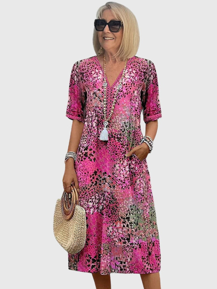Zomerjurk met vrolijke bloemenprint en handige zakken