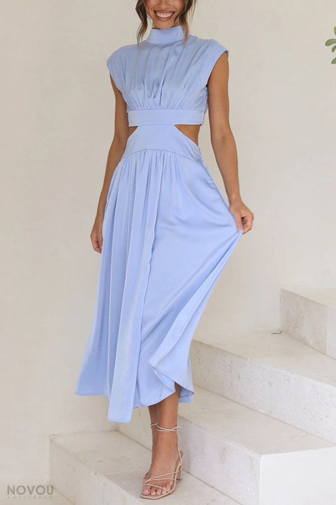 Stijlvolle midi jurk met col voor dames, perfect voor de warme dagen. Met unieke taille-uitsparing.