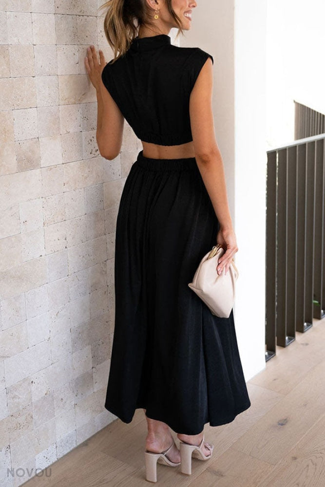 Elegante zomerjurk voor dames, midi model met hoge col en unieke taille-uitsparing. Zeer comfortabel.