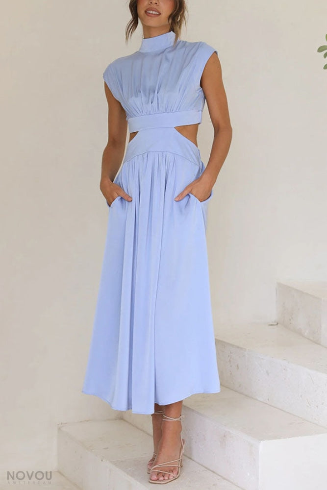 Zomerjurk dames, midi, met een moderne col en subtiele taille-uitsnede. Jouw nieuwe favoriet.