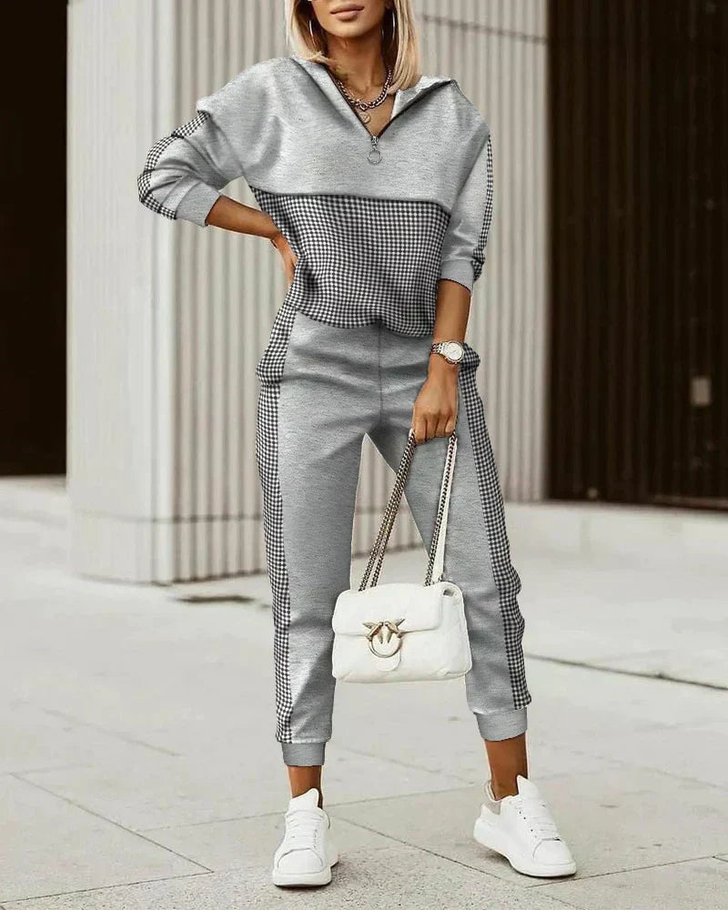 Dames modern trainingset, combineert stijl en comfort moeiteloos. Een complete sportieve casual outfit.