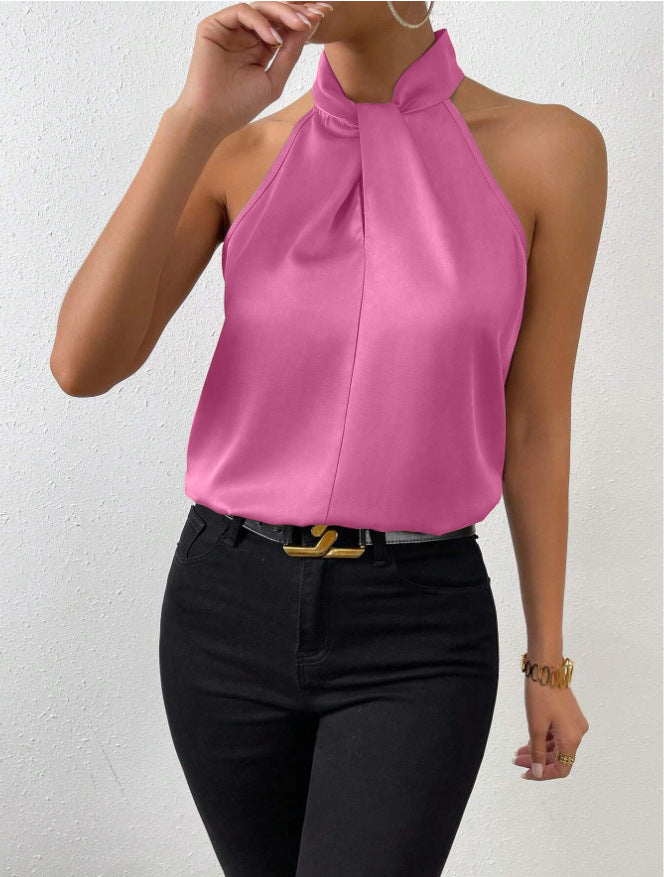 Damestanktop, mouwloos en minimalistisch, met vloeiende pasvorm en trendy halternek.