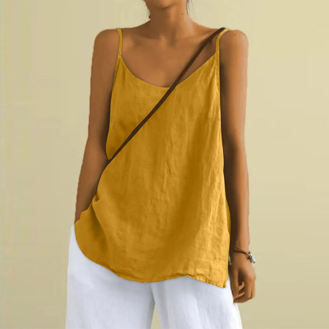 Modieuze losvallende dames zomertop met V-hals. Een luchtige mouwloze top voor comfortabele zomerse dagen.