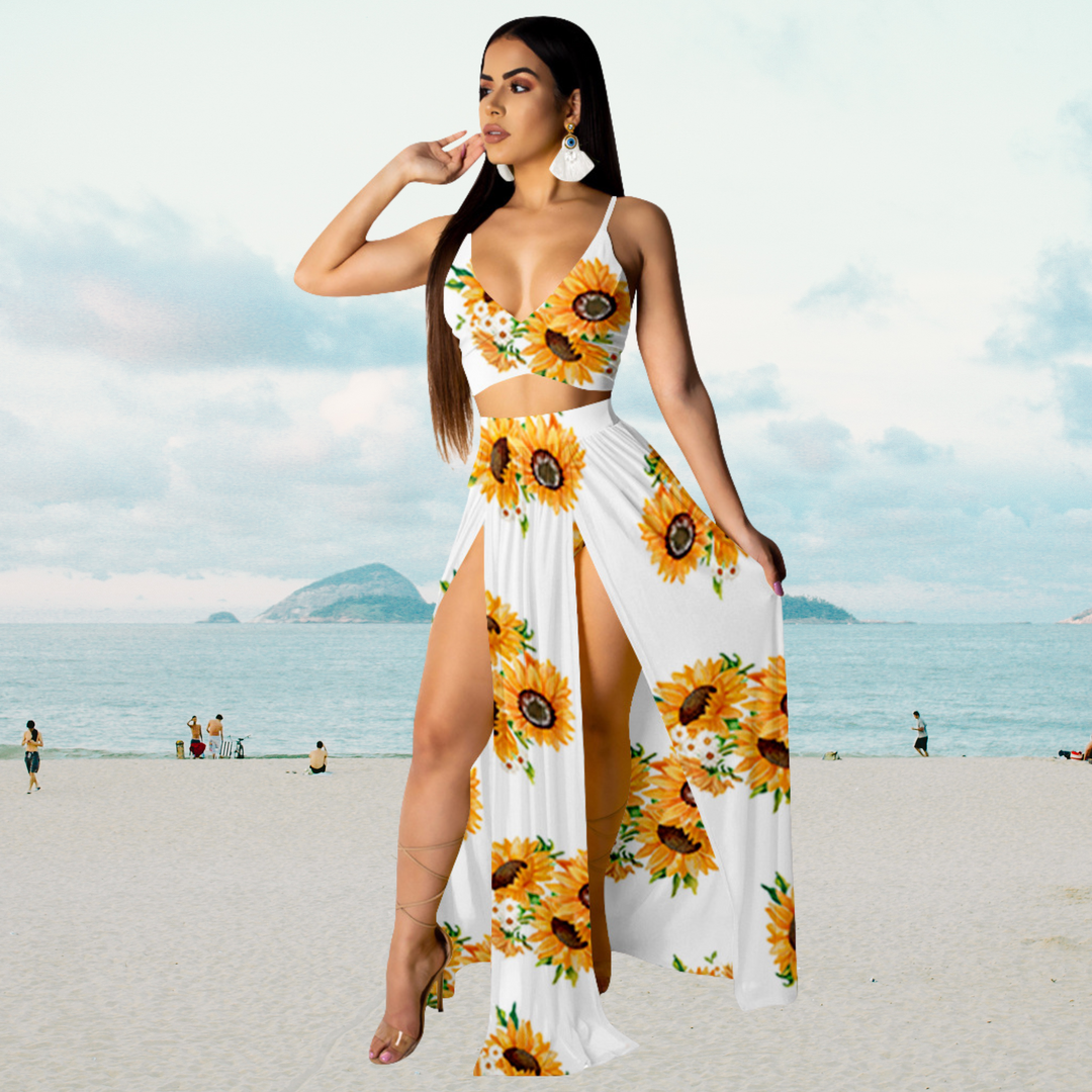 Trendy Naïma dames zomeroutfit: complete set met een flatterende haltertop en een lange, luchtige rok met split.