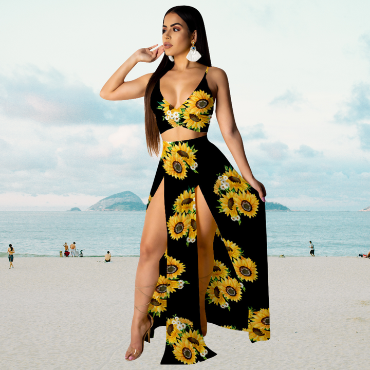 Chique dames tweedelige zomerset Naïma, met een elegante haltertop en een flowy lange rok met split voor diverse gelegenheden.